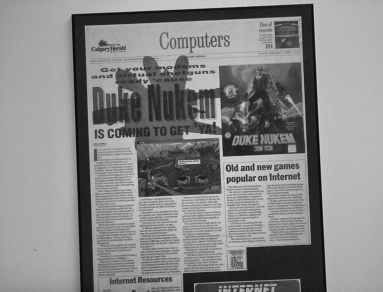 Framed newspaper clipping from the front page of a computer magazine